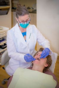 Dr. Bonanni doing a dental exam