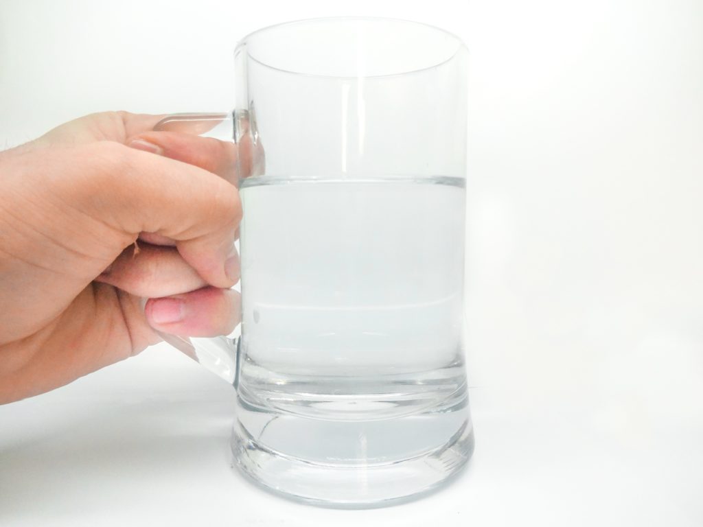 hand with water glass