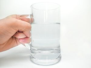 hand with water glass